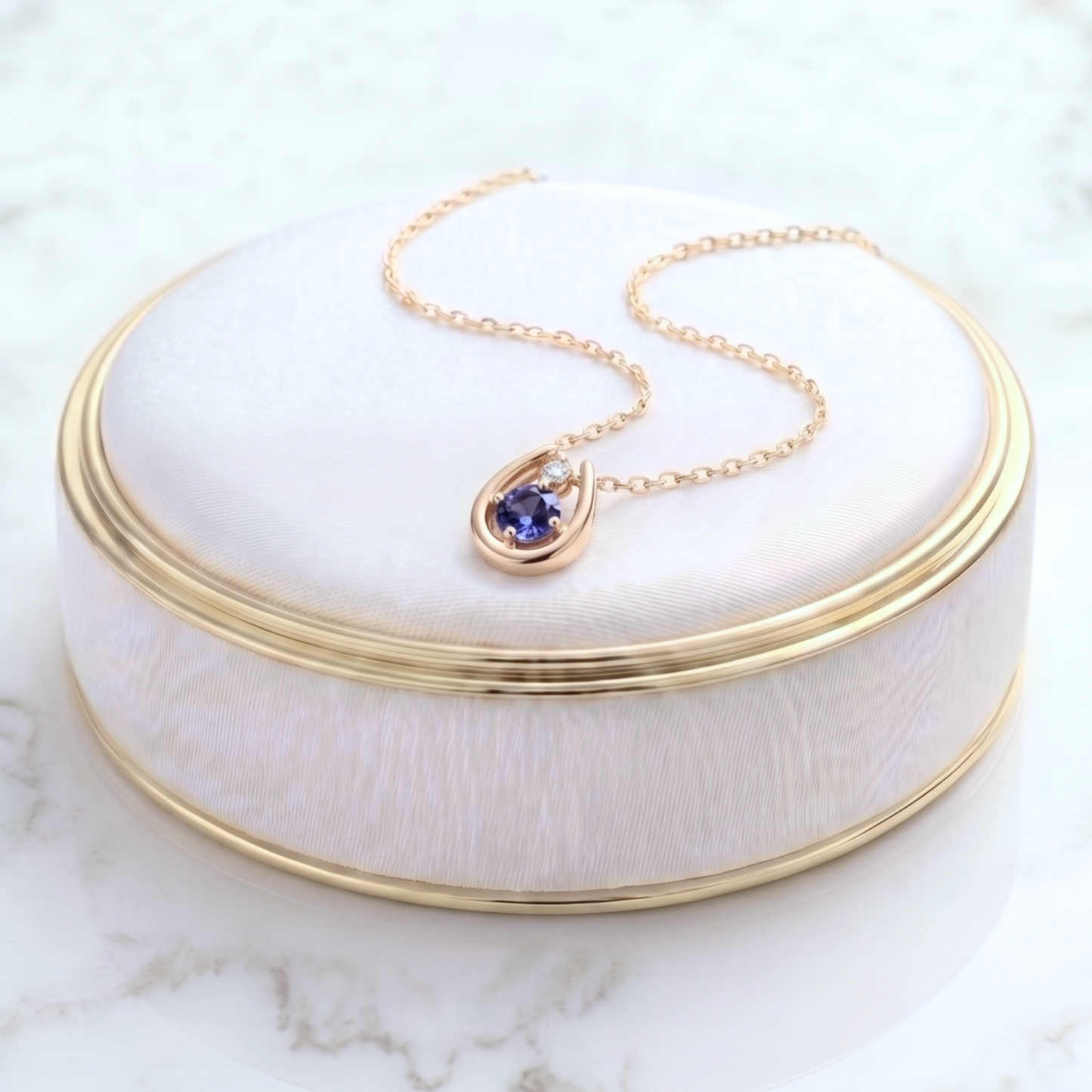 タンザナイト×ダイヤモンド0.01ct ホースシューネックレス K10YG