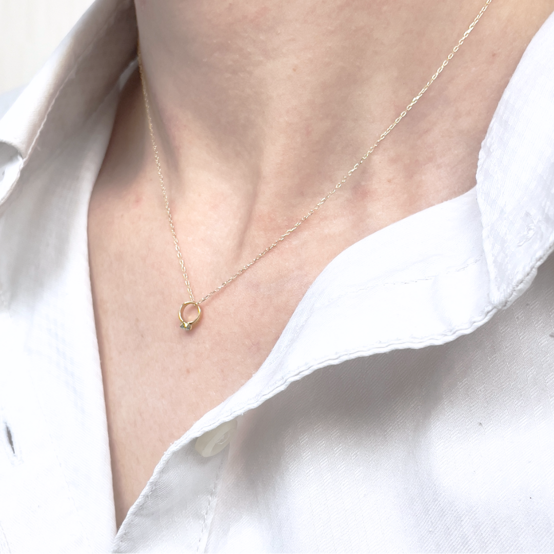 ブルートパーズ ベビーリングネックレス K10YG