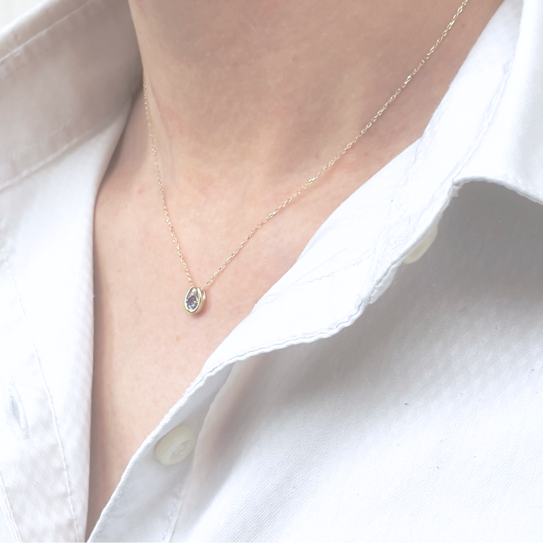 タンザナイト×ダイヤモンド0.01ct ホースシューネックレス K10YG