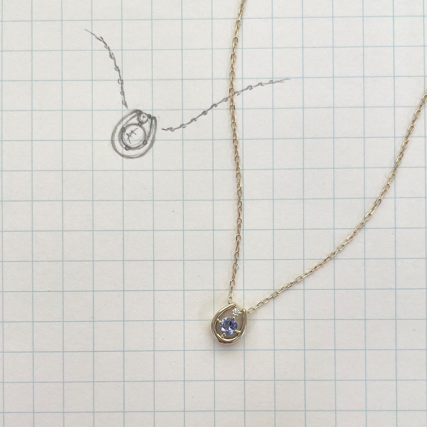 タンザナイト×ダイヤモンド0.01ct ホースシューネックレス K10YG